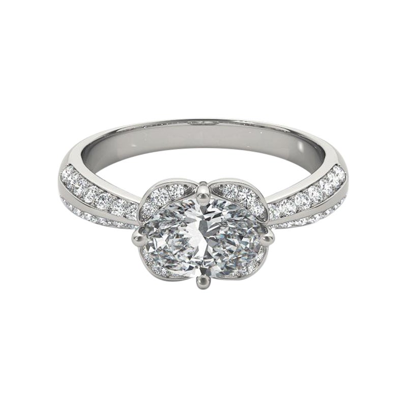 Bague à diamant en platine certifiée GIA de 1.4 carat avec halo ovale est-ouest et double pavage