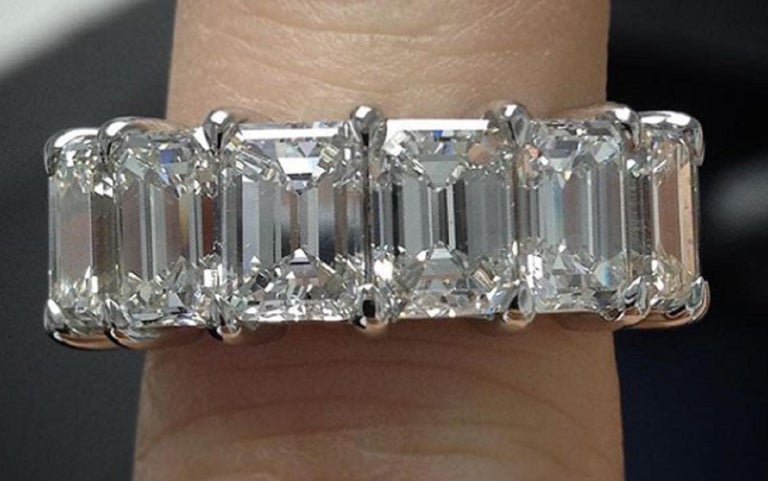 Modern GIA Certified 14 Carat Emerald Cut Diamond Eternity Band Ring Set in Platinum For Sale