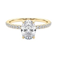 Bague en or jaune 18 carats certifiée GIA avec diamant ovale de 1,4 carat et halo caché en pavé