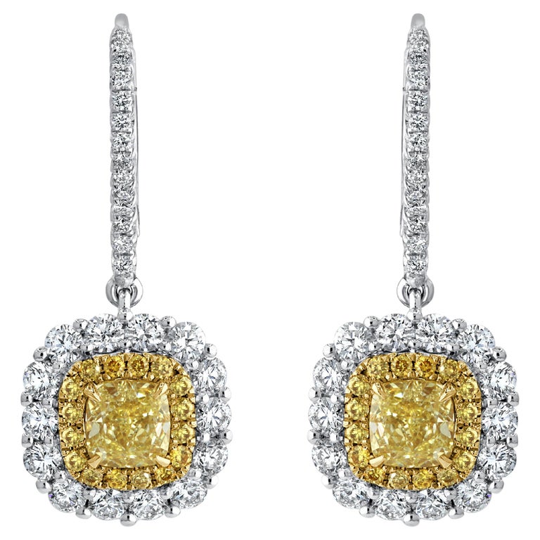 GIA Certified 1.4 Carat Yellow Cushion Cut Earrings with 2.95 Carat Total Weight For Sale