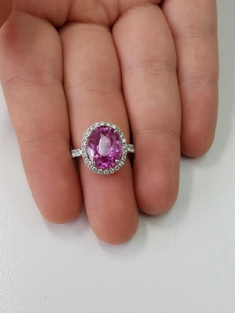 Contemporary GIA Certified 14 Karat White Gold Oval Cut Pink Sapphire and Diamond Ring