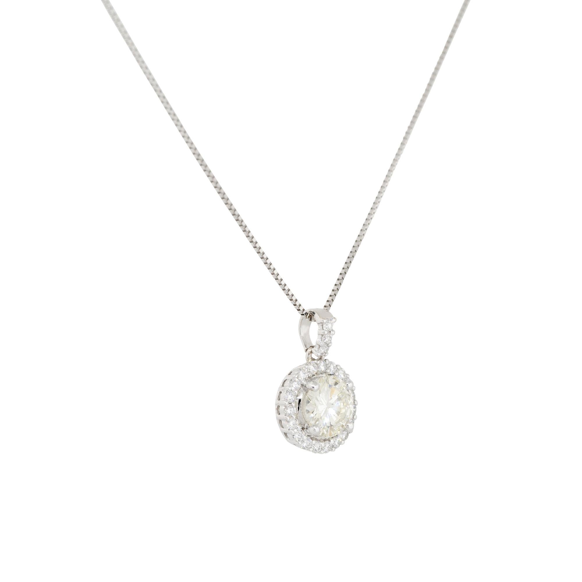 GIA Certified 18 Karat White Gold 1.40 Carat Total Weight Diamond Halo Necklace
Material: Pendant: 18k White Gold, Chain: Platinum
Main Diamond Details: The main stone is a 1.10ct Round Brilliant cut diamond. The diamond is certified by the