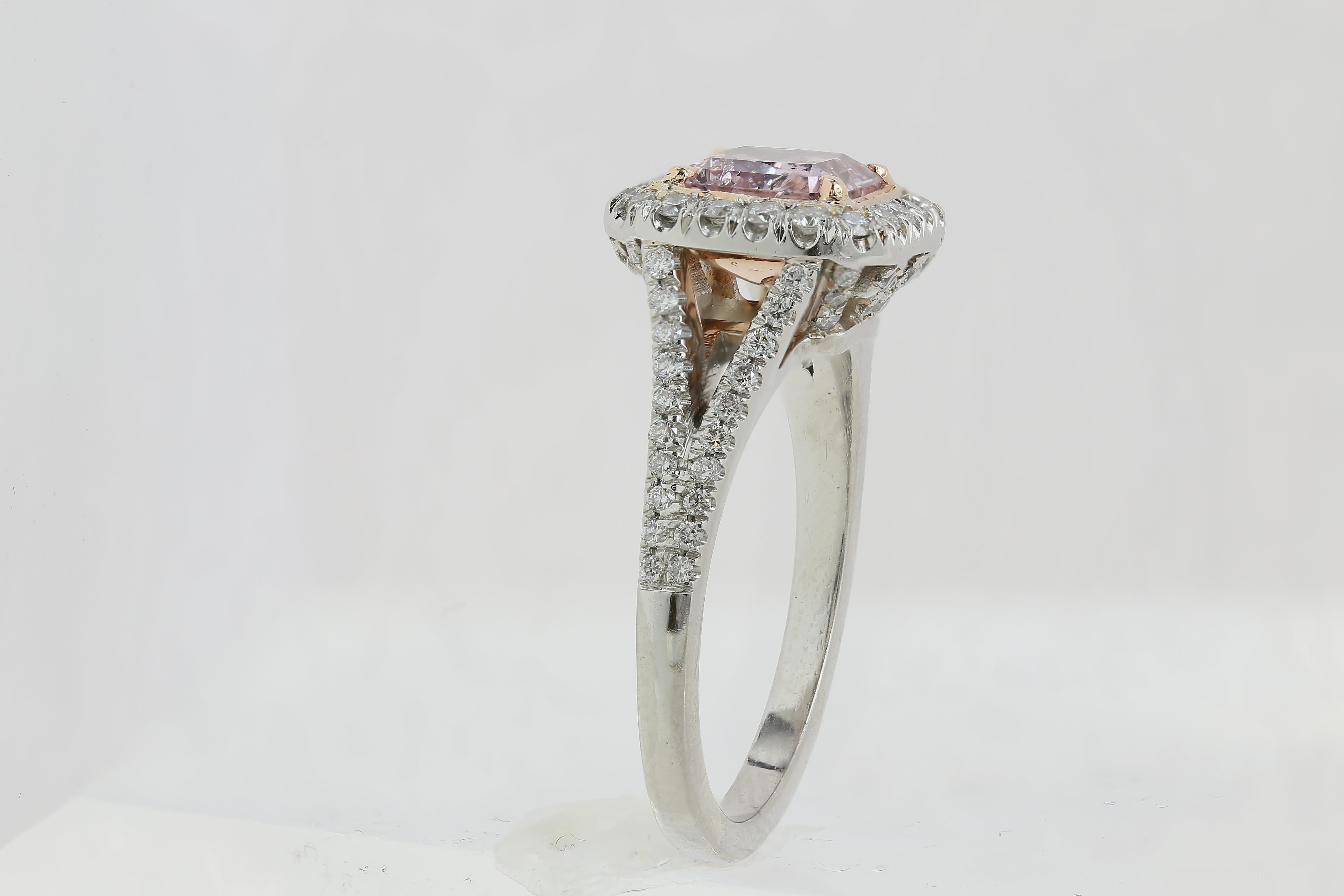 GIA cetified 1.40 ct Fancy Purple-Pink Radiant Diamond cert# 2145794129 w/ Halo Setting, set in 18kt Rose Gold and Platinum.  Split shank with diamonds extending halfway down shank, with decorative scrolling in pave beneath.
