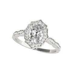 Anello con diamante ovale aureolato certificato GIA da 1,40 carati in oro bianco cattedrale