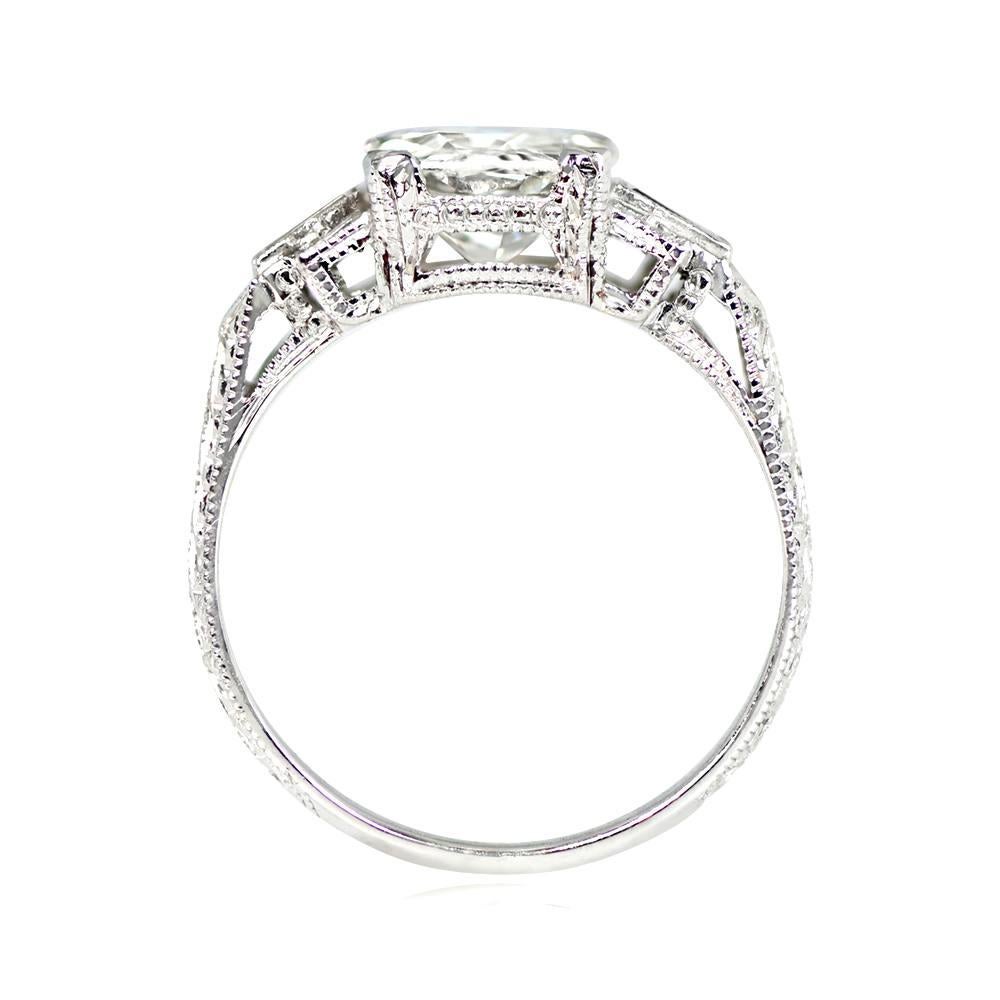 Antique Art Deco engagement ring with 1.85ct old European cut diamond (J, VS1) in prongs, flanked by French cut natural sapphires (0.20ct) and 0.37ct of single cut diamonds. Handcrafted in platinum with milgrain detailing, circa 1920.

Ring Size: