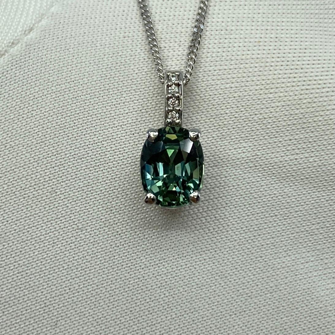 GIA Certified Untreated Green Blue Sapphire & Diamond Platinum Pendant Necklace.

Untreated 1.40 Carat oval cut sapphire with a stunning vivid blue-green colour and excellent clarity. A very clean stone.

This sapphire also has an excellent oval cut