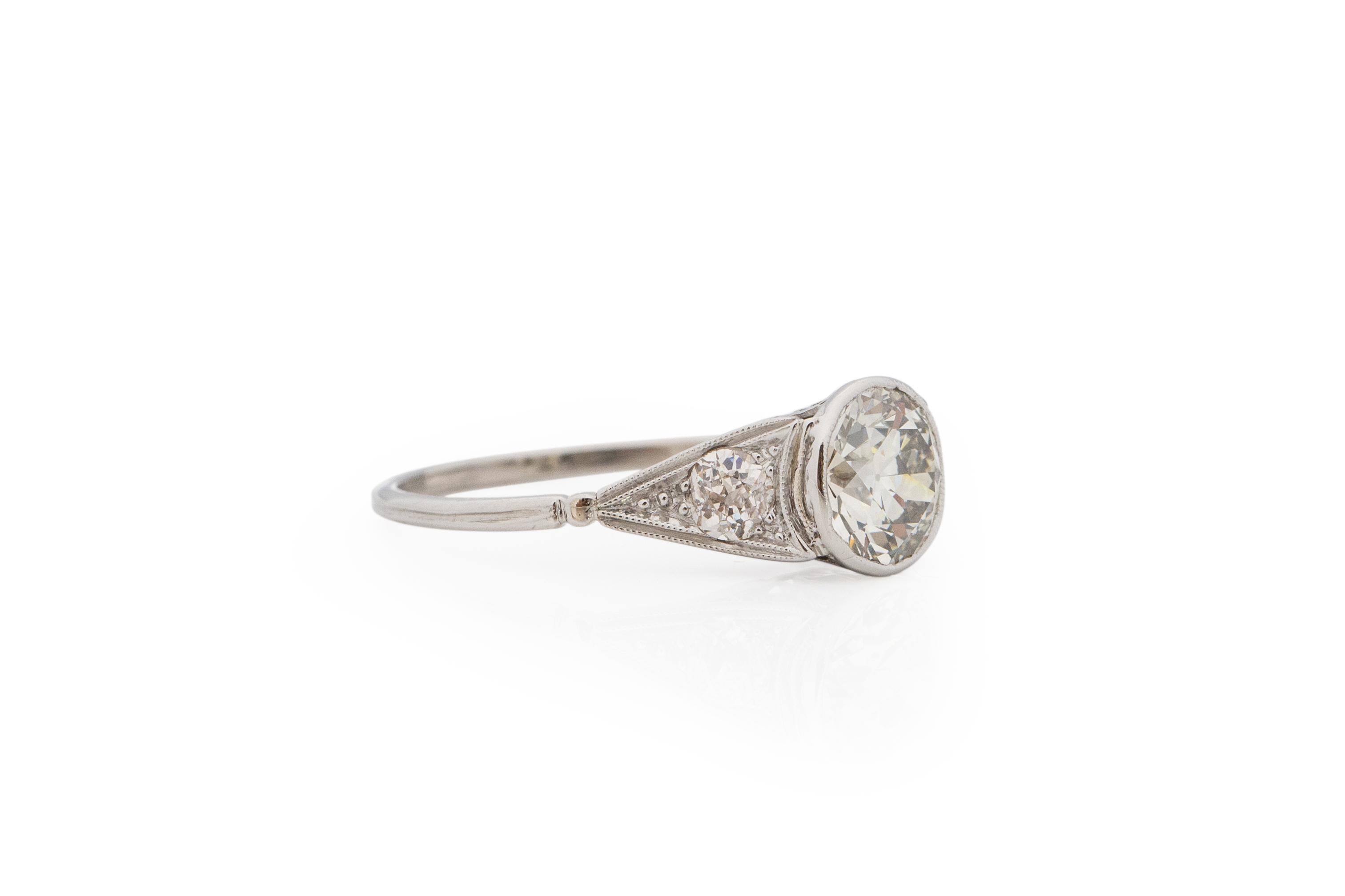 Ring Size: 7.25
Metal Type: Platinum [Hallmarked, and Tested]
Weight: 3.2 grams

Center Diamond Details:
GIA REPORT #: 6214579794
Weight: 1.41
Cut: Old European brilliant
Color: M
Clarity: SI2
Measurements: 7.18 x 7.16 x 4.38mm

Side Stone