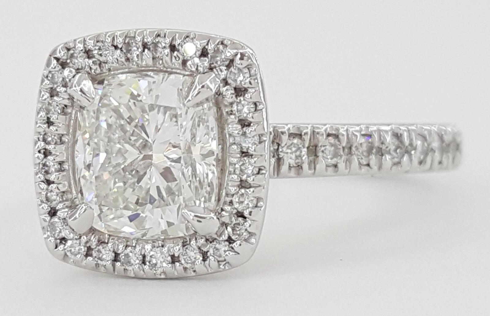 Contemporary GIA Certified 1.41 Carat Cushion Cut Diamond Halo Engagement Platinum Ring For Sale