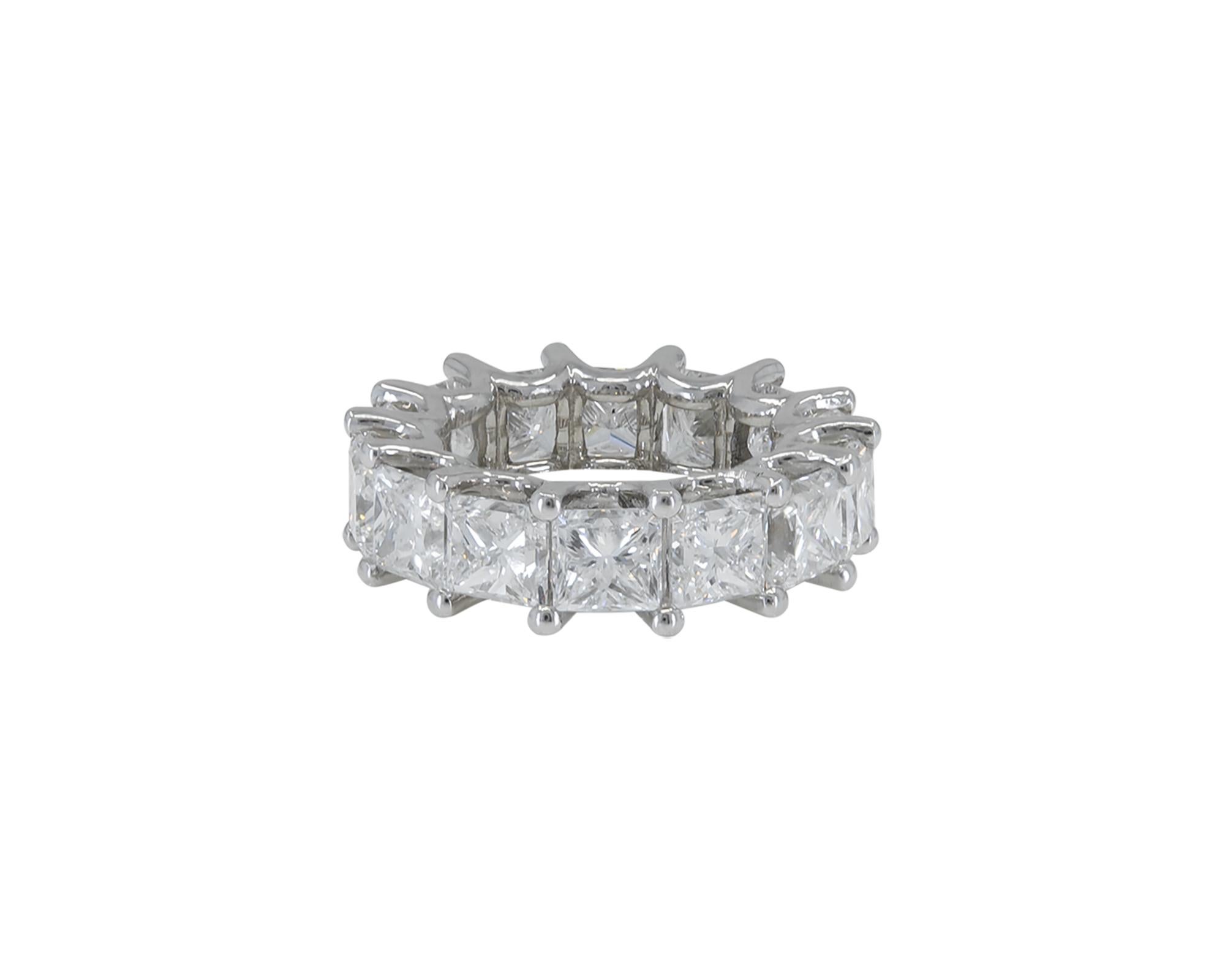 A classic and elegant eternity band made with 14 princess-cut diamonds set in platinum.
The diamonds are accompanied with GIA certificates stating that the colors are D-E-F, clarity is VVS-VS.
Weight of platinum us 12.97 grams.
Size of the ring is