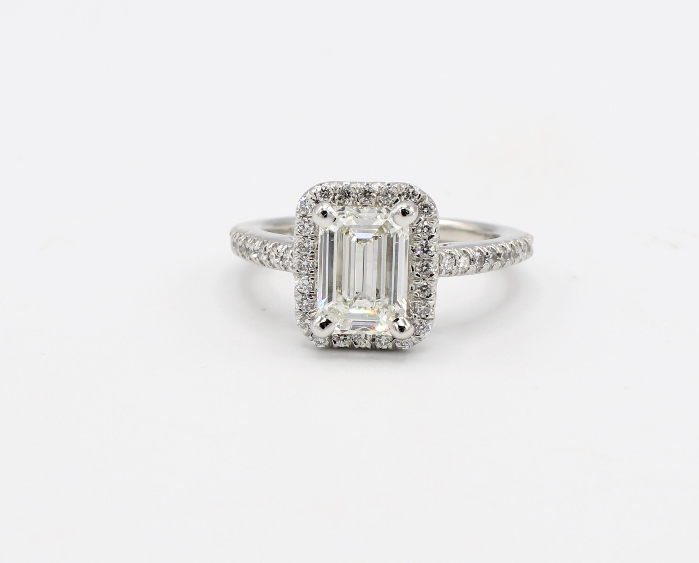 GIA Certified 1.43 I IF Carat Emerald Cut Halo Diamond Platinum Engagement Ring Size 4.5 

GIA Report Number: 5136532345 (please note picture of report copy for details)
Carat weight: 1.43 carat
Color: I
Clarity: Internally Flawless 
Polish: