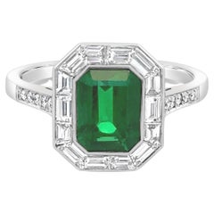 Anello di fidanzamento aureolato con diamanti e smeraldo da 1,43 carati certificato GIA