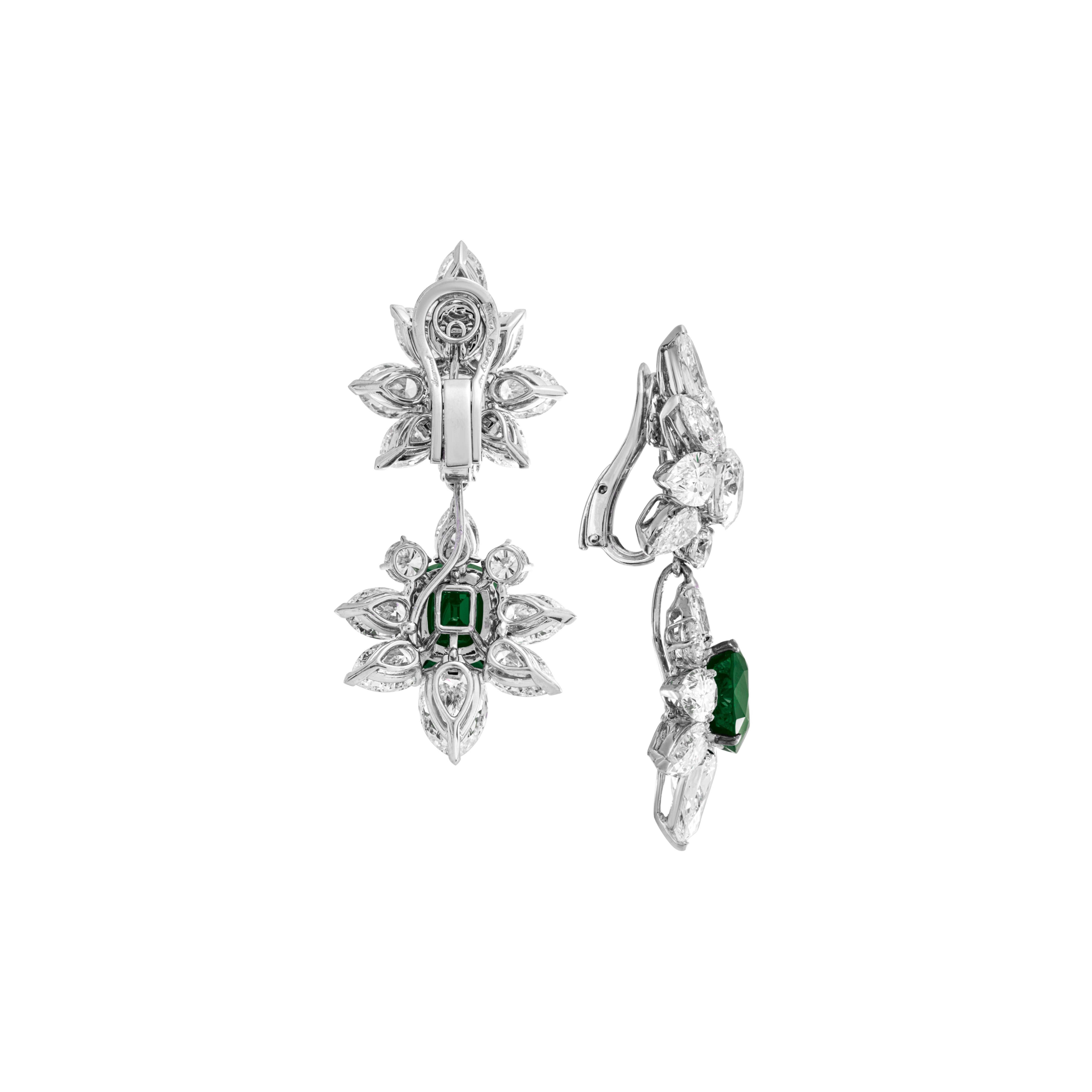 Cushion-shaped GIA certified emeralds of  7.47 carats and 6.88 carats, round and pear-shaped diamonds, 18k white gold, pendants
