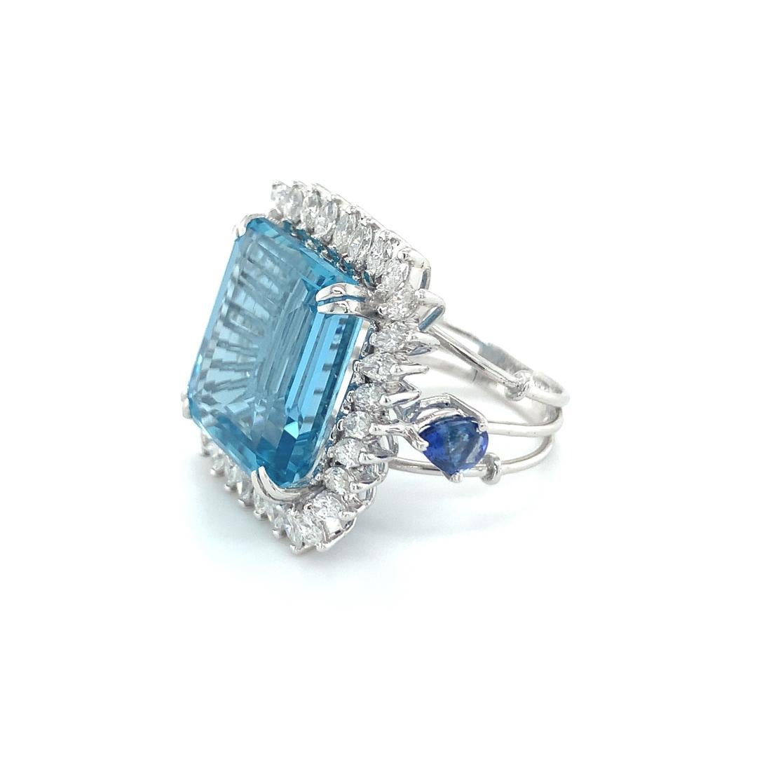 14.37 Carat Natural Brazilian Aquamarine with natural Sapphire 1.11 Carat with diamond set in 18 kt white gold