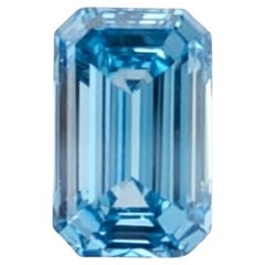 GIA Certified 1.43ct Fancy Vivid Greenish Blue Diamond, Emerald Cut, VS1