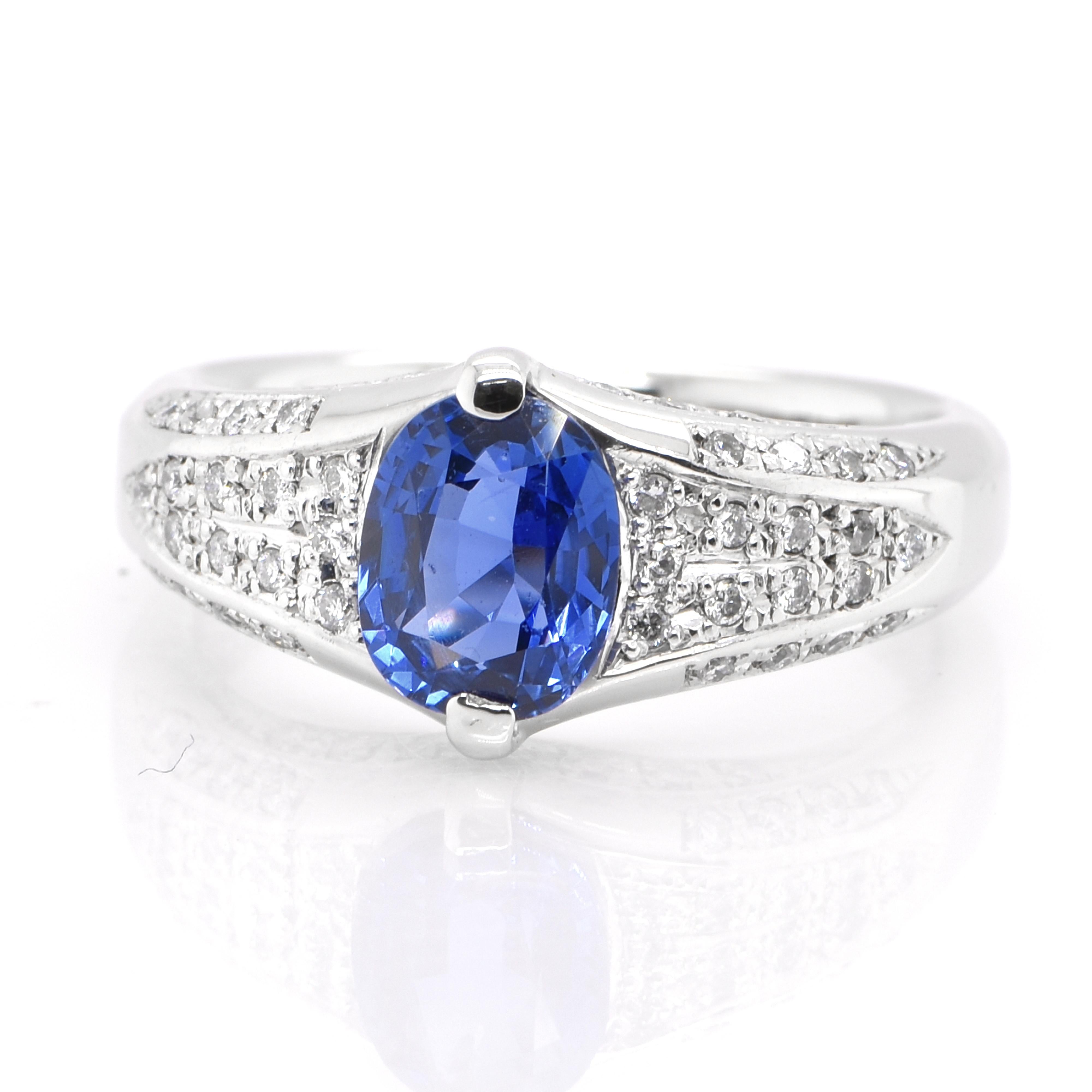 A beautiful ring featuring GIA Certified 1.44 Carat Natural No Heat, Burmese Sapphire and 0.20 Carats Diamond Accents set in Platinum. Sapphires have extraordinary durability - they excel in hardness as well as toughness and durability making them