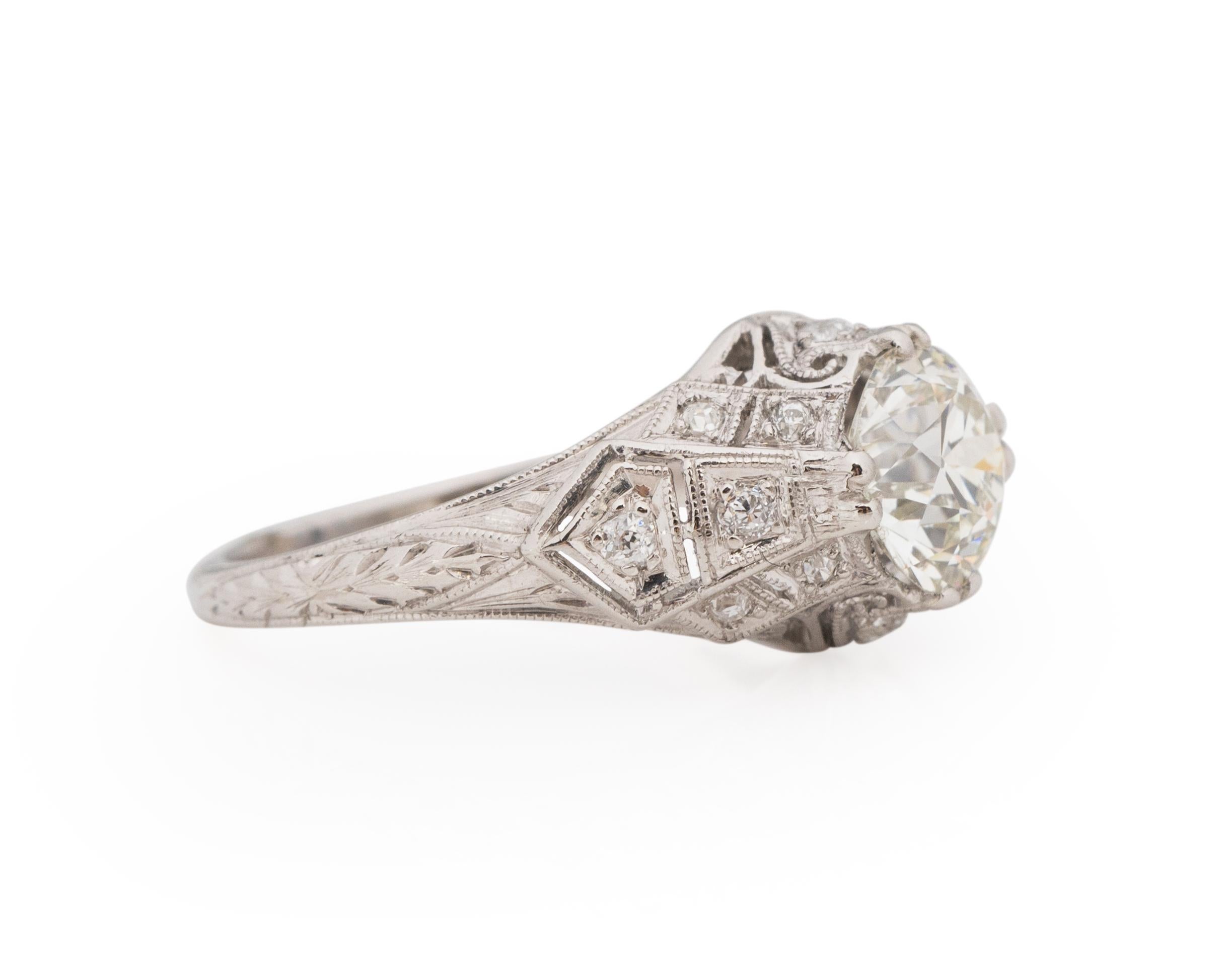 Ring Size: 6.75
Metal Type: Platinum [Hallmarked, and Tested]
Weight: 4.0 grams

Center Diamond Details:
GIA REPORT #: 6224027248
Weight: 1.45ct
Cut: Old European brilliant
Color: L
Clarity: SI1
Measurements: 7.28mm x 7.08mm x 4.64mm

Side Stone