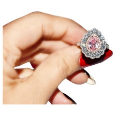 GIA Certified 1.46 Carat Fancy Orangy Pink Diamond Ring 