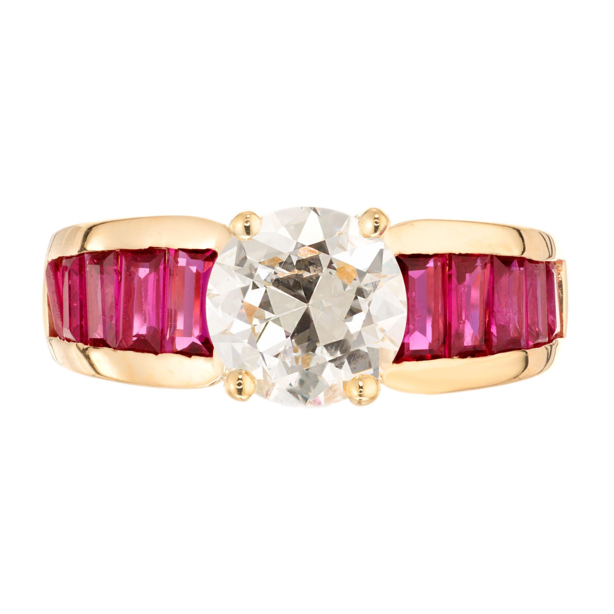 1950's Mid-Century Diamond and ruby engagement ring. GIA certified transactional cut center diamond circa 1950's, accented with 10 step cut channel set baguette rubies. GIA certified purplish red natural rubies. Simple heat only. GIA certified round