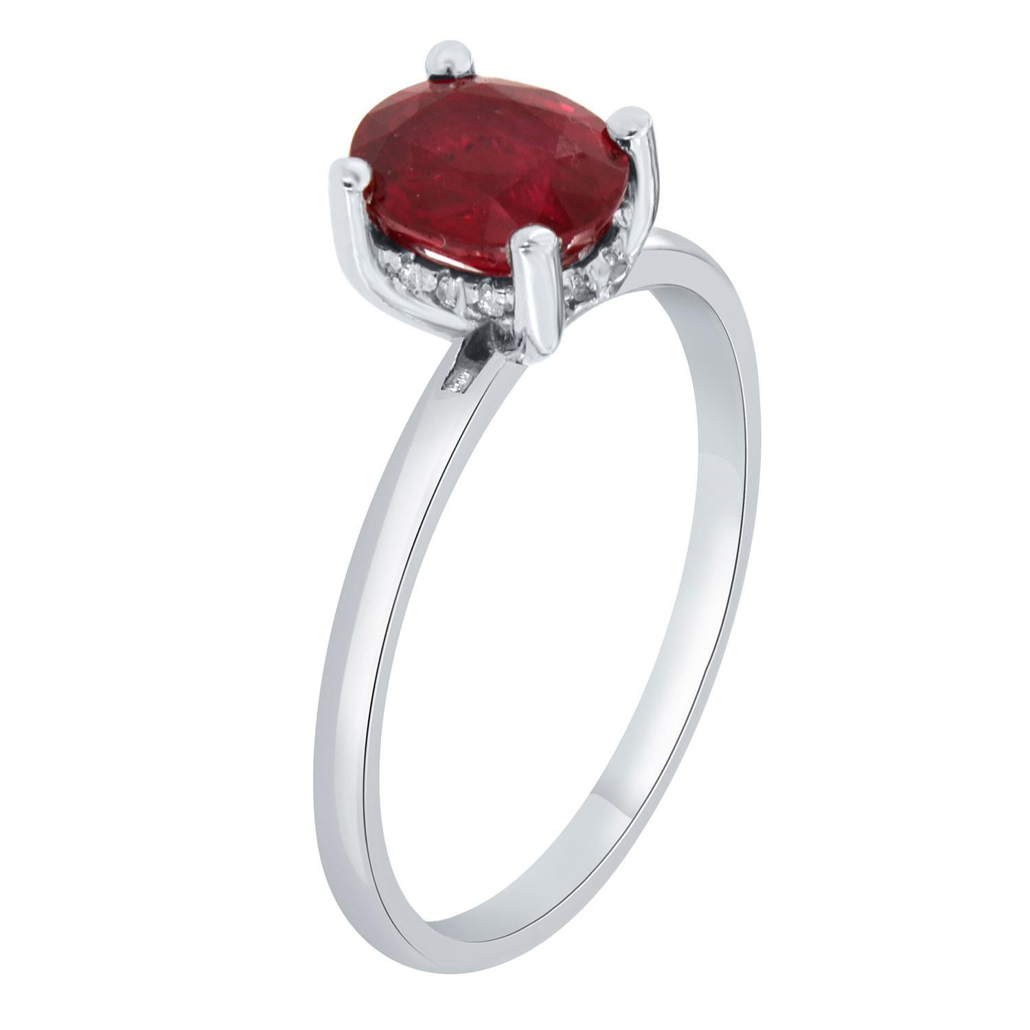 This delicate platinum setting feature a 1.47 -carat vibrant deep red ruby GIA certified that exhibits an excellent luster. The ruby is four prongs set on a 1.5 mm wide band. A row of hidden halo of round diamonds completes this beautiful ring. 