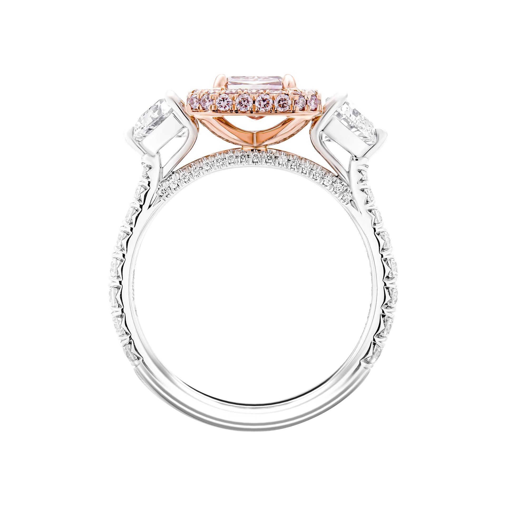 3 stone engagement ring in Platinum & 18K Rose Gold 
Center stone: 1.47ct Natural Fancy Brownish Pink VS2 Radiant Shape Diamond GIA#2225616451 
Side stones: 0.50ct F IF Heart Shape Diamond GIA#5222052674
                      0.53ct F IF Heart Shape