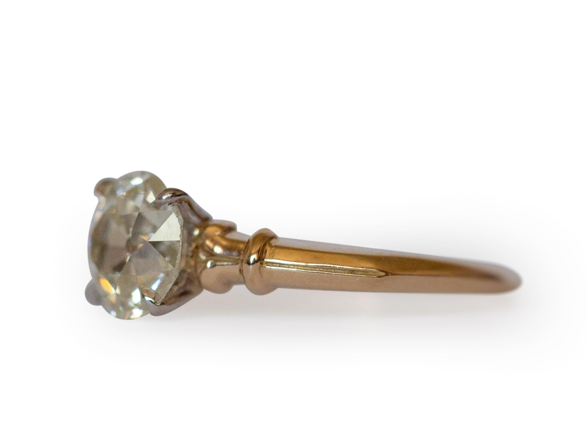 Ring Size: 6.5
Metal Type: 14K Yellow Gold and Palladium [Hallmarked, and Tested]
Weight:  3.5 grams

Center Diamond Details:
GIA REPORT #:1216129406
Weight: 1.49 carat
Cut: Old European Brilliant
Color: M
Clarity: VS1



Finger to Top of Stone