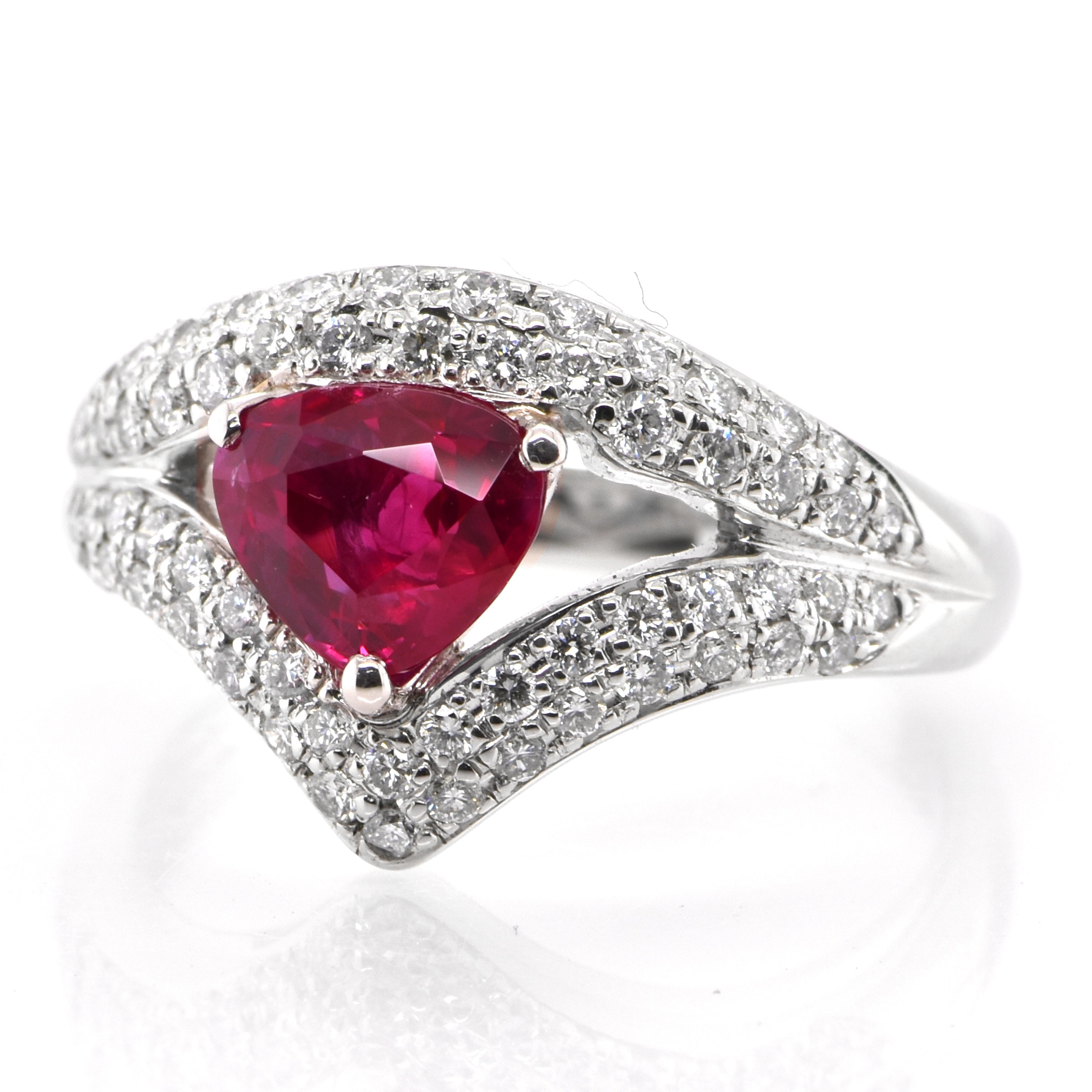 A beautiful Ring set in Platinum featuring a GIA Certified 1.49 Carat Natural Burmese Ruby and 0.48 Carat Diamonds. Rubies are referred to as 