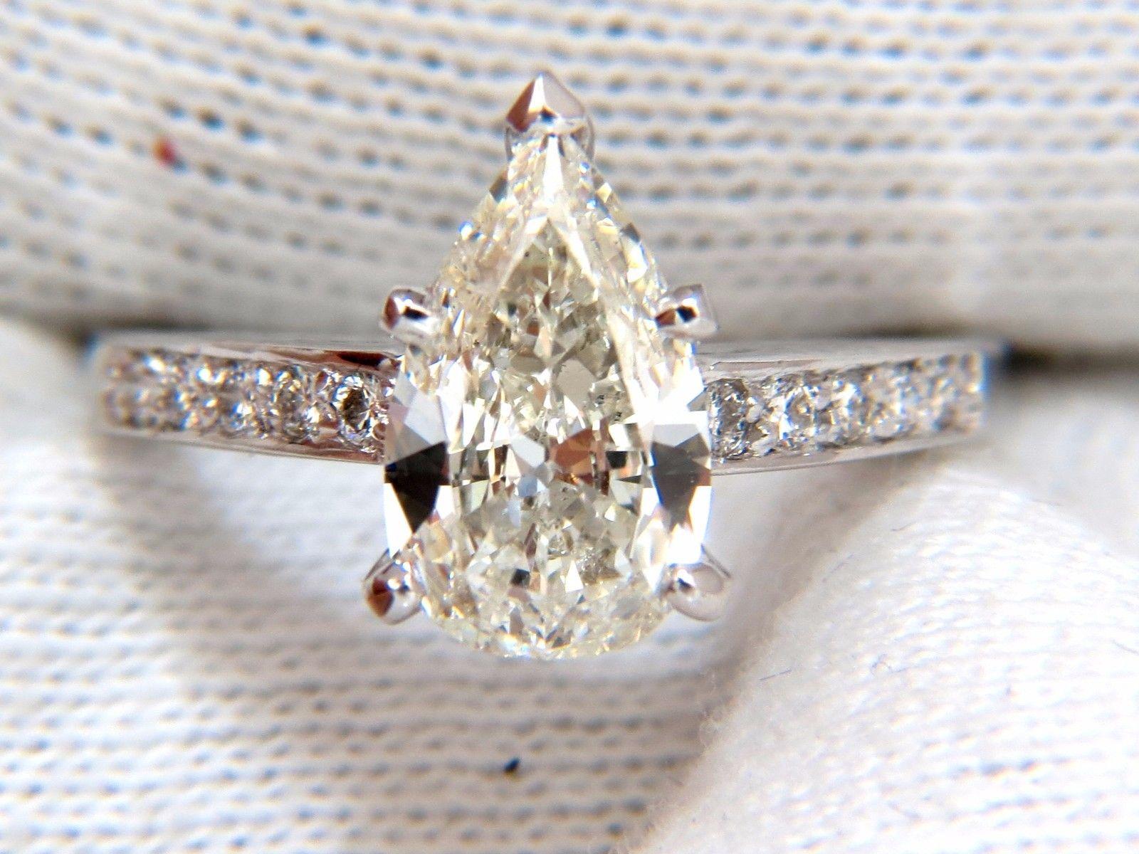 GIA Certified 1.49ct Pear Shape diamond ring .20ct. round accents 14kt In New Condition For Sale In New York, NY