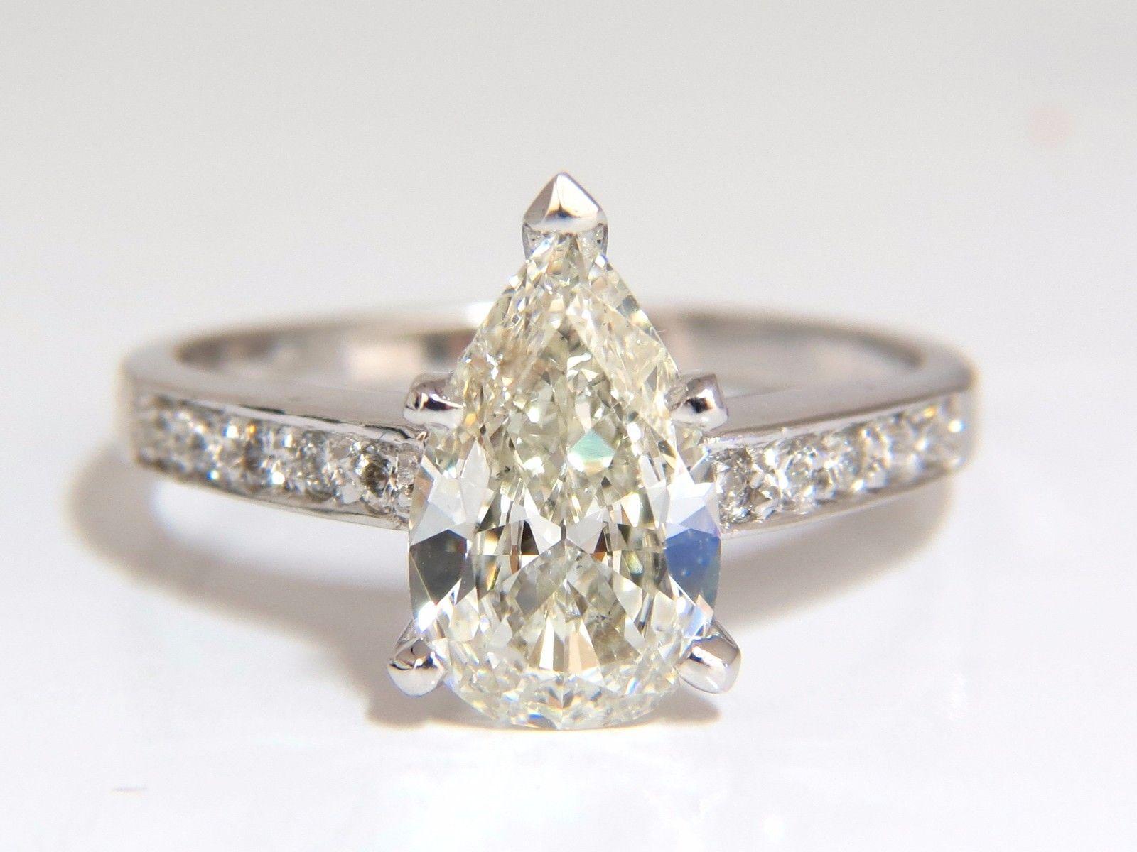 Bague en diamant en forme de poire de 1,49 carat avec accents ronds de 0,20 carat, 14 carats, certifié GIA en vente 4