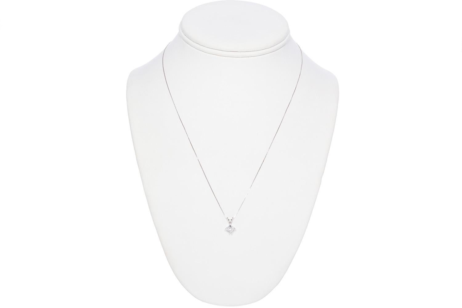 We are pleased to present this Ladies GIA Certified 14k E/VVS2 White Gold & Princess Diamond Pendant Necklace. This cute piece features a GIA certified and laser inscribed colorless and near flawless 0.60ct E/VVS2 princess cut diamond pendant on a
