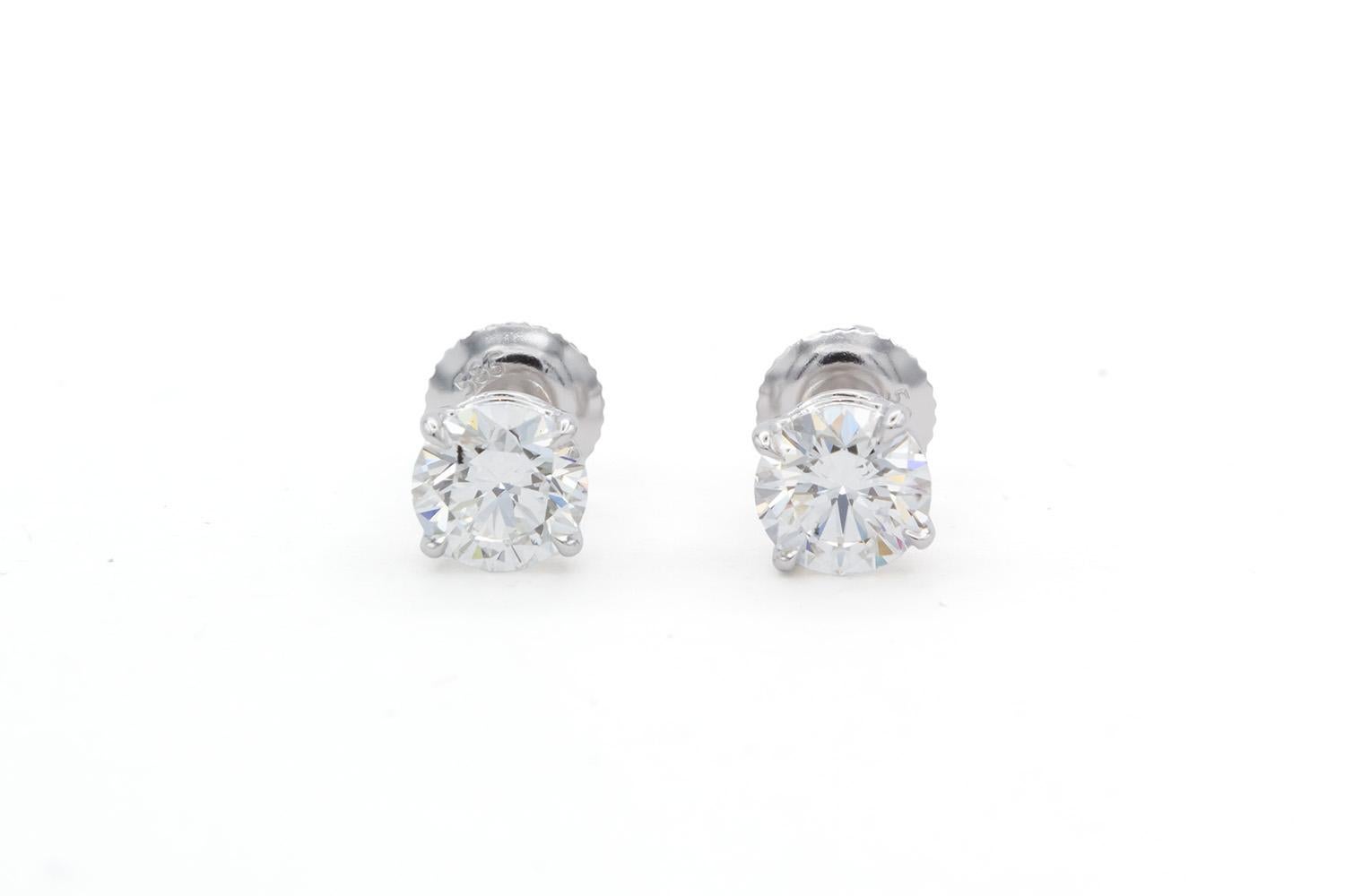 We are pleased to present these GIA Certified 14K White Gold & Diamond Stud Earrings. These beautiful earrings feature two GIA certified F-G/VS1 Round Brilliant Cut Diamonds set in 14k White Gold studs with screw back setting. Both diamonds measure