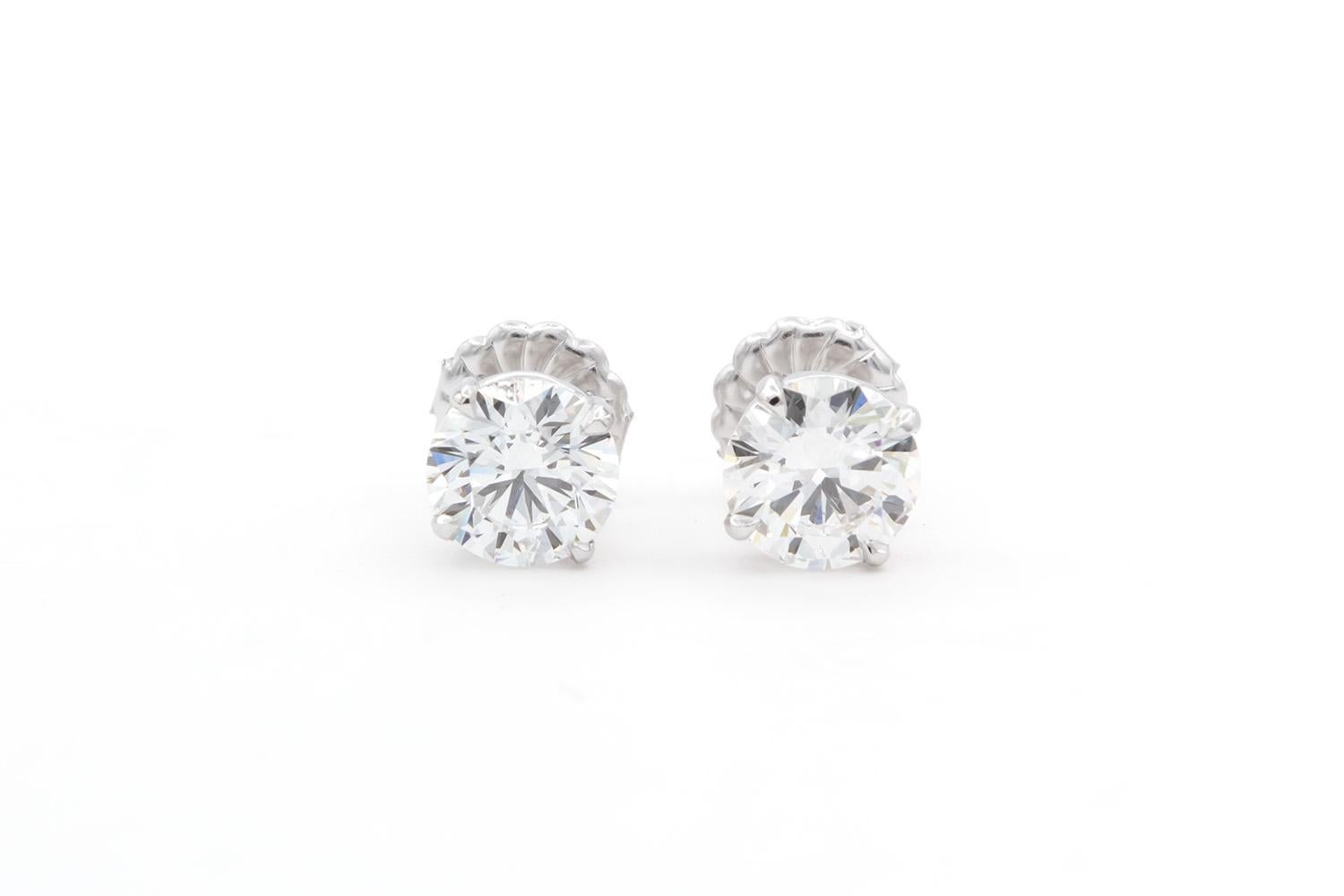 Contemporary GIA Certified 14k White Gold & Round Brilliant Cut Diamond Stud Earrings 2.29ctw For Sale