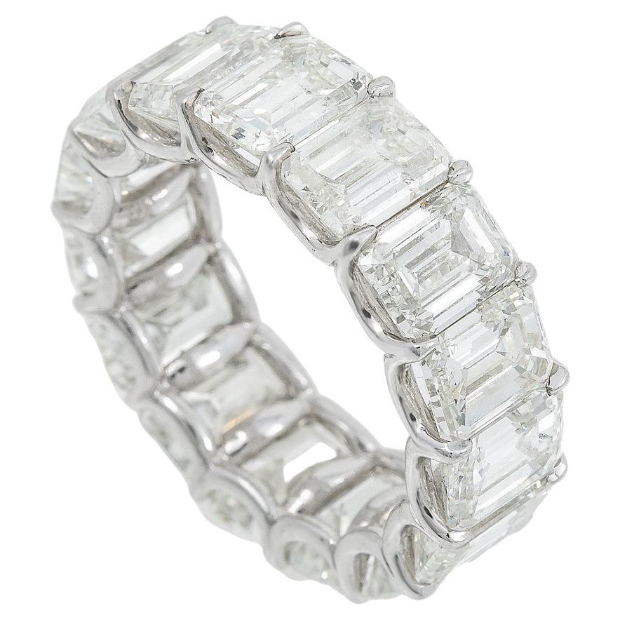 Discover elegance with our platinum eternity band, featuring 15 exquisite GIA-certified emerald-cut diamonds. Each diamond shines brilliantly with a color range of F-G and clarity between VVS1-VS2, totaling an impressive 15.38 carats. Set in a