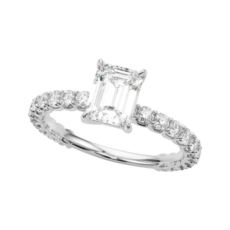 Smeraldo certificato GIA da 1.5 carati con anello di diamanti a eternità parziale