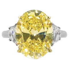 Bague en diamant ovale certifié GIA de 5 carats de couleur jaune clair fantaisie