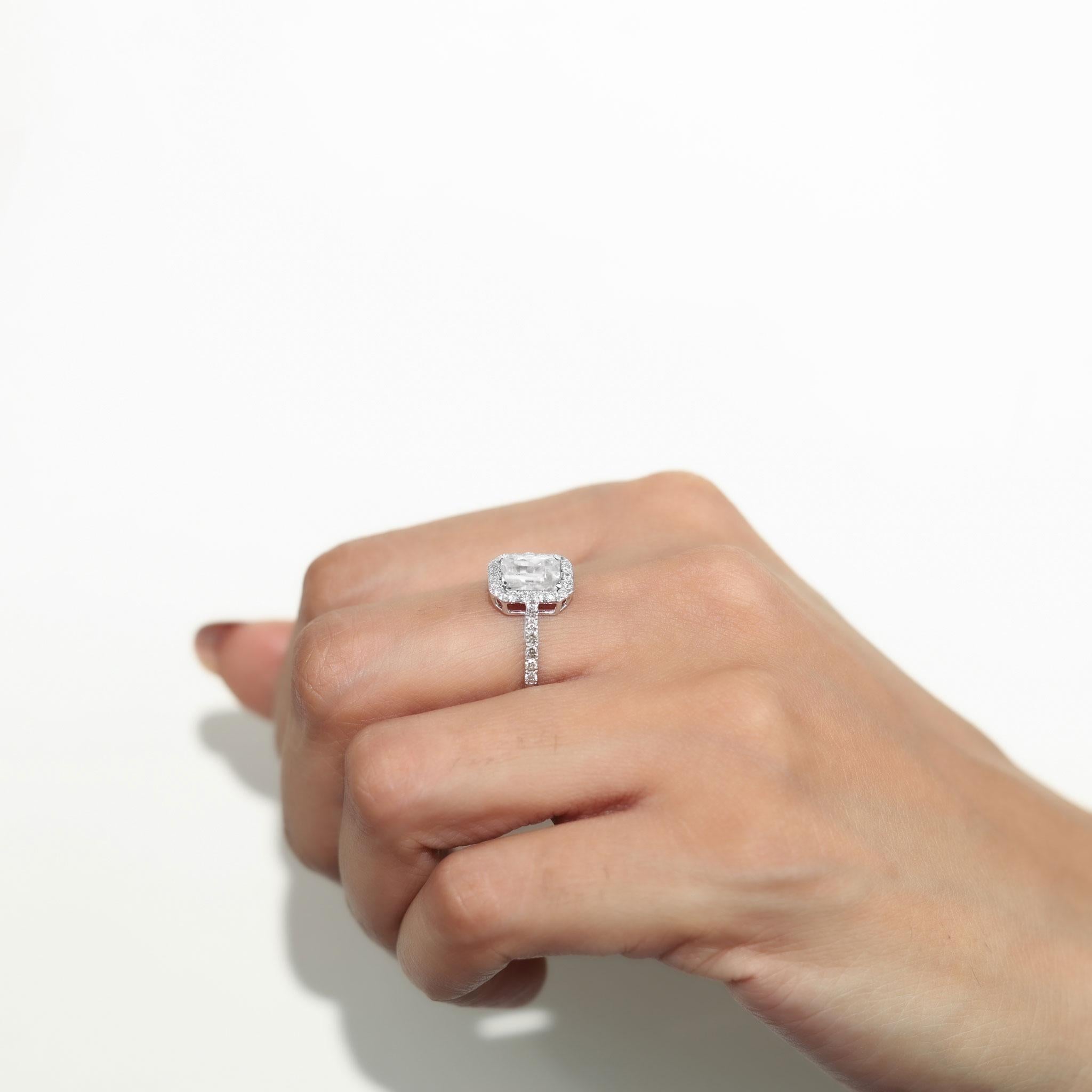 GIA Certified 1.5 Carat G VS Radiant Cut Diamond Halo Engagement Ring 

Available in 18k white gold.

Same design can be made also with other custom gemstones per request.

Product details:

- Solid gold

- Side diamond - approx. 0.5 carat G VS 

-