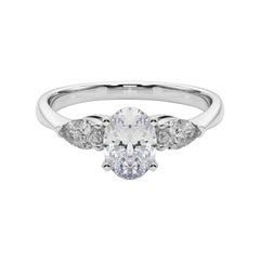 GIA Certified 1.5 Carat Oval East-West Three-Stone Diamond Ring