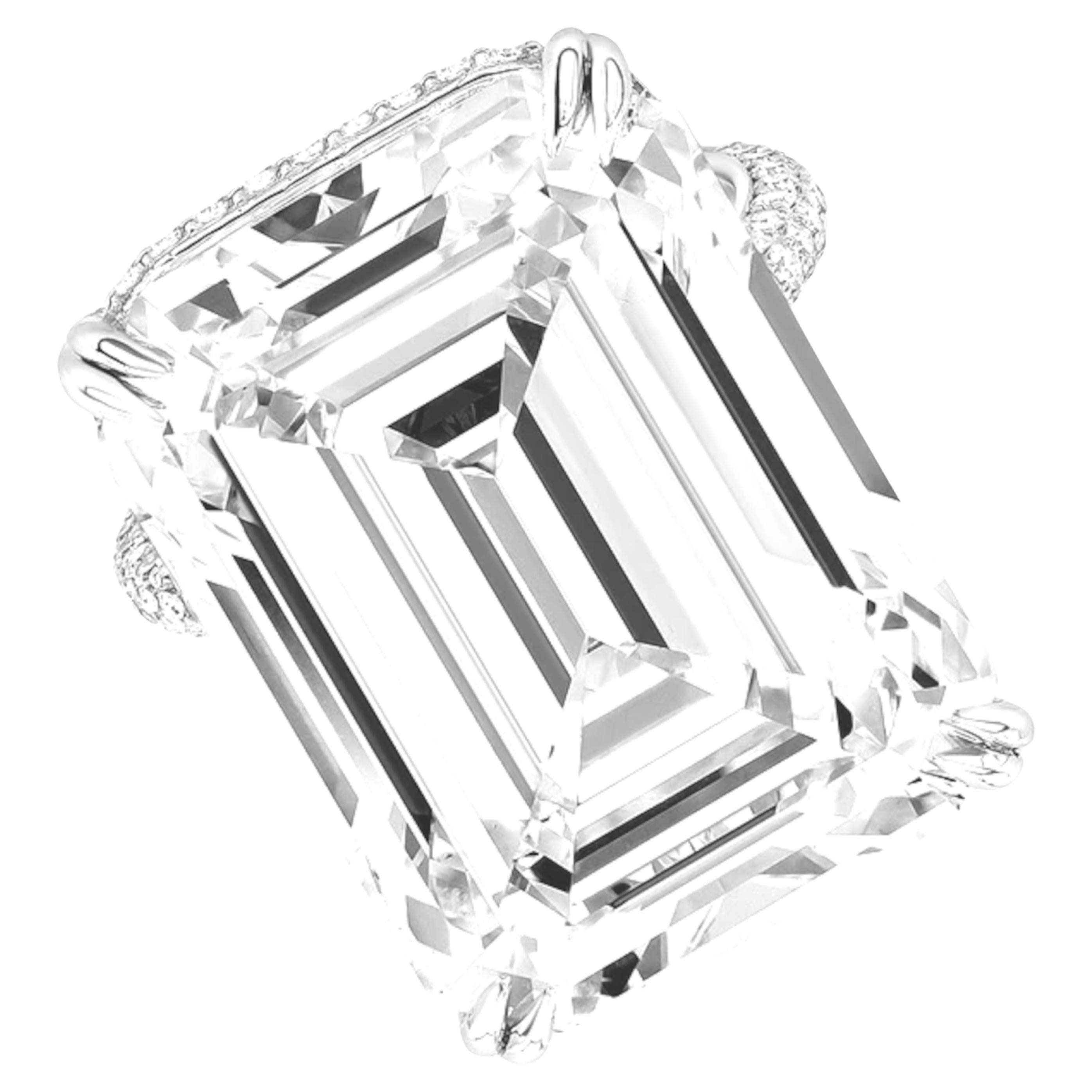 Llama la atención con este extraordinario anillo de diamantes de 15,00 quilates certificado por el GIA, una impresionante declaración de elegancia y prestigio. Expertamente engastada en platino y acentuada con una delicada banda de pavé, esta obra