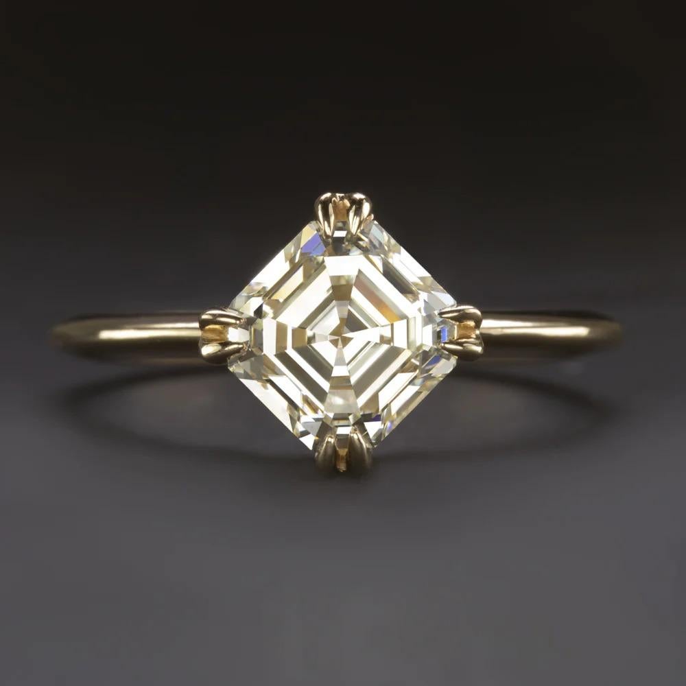 Sleek and sophisticated, this diamond solitaire showcases a substantial 1.52ct asscher cut diamond in buttery 18k yellow gold.

Highlights:

- GIA certified 1.52ct center diamond with a truly gorgeous asscher cut

- Great SI2 with a thin side