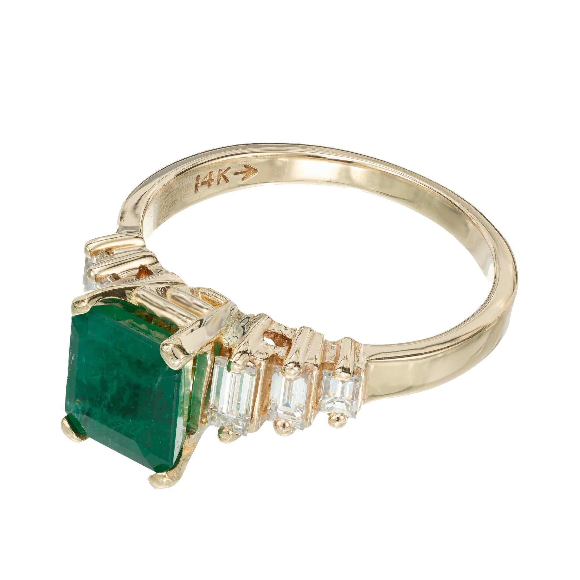 Classic 1960’s vintage rich green Emerald cut Emerald and diamond engagement ring. GIA certified 1.50ct octagonal step cut center emerald set in a 14k yellow gold setting with 6 baguette cut diamonds. 

1 octagonal step cut green Emerald, approx.