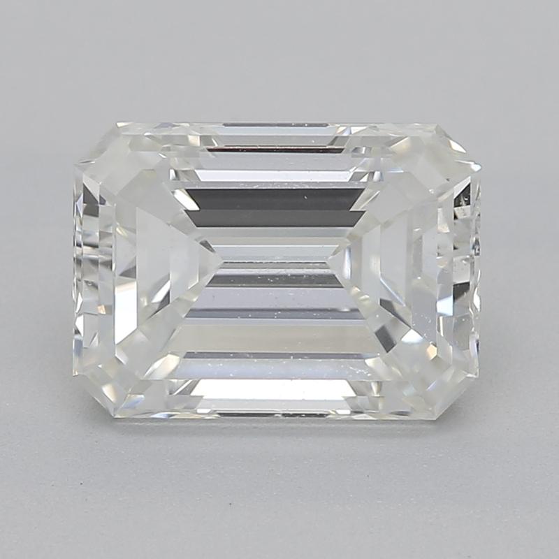 Handcrafted in New York, this exquisite diamond ring is a remarkable testament to elegance and craftsmanship, featuring a breathtaking emerald I SI1 1.50 center stone. Set in luxurious white gold , the design is a harmonious blend of classic