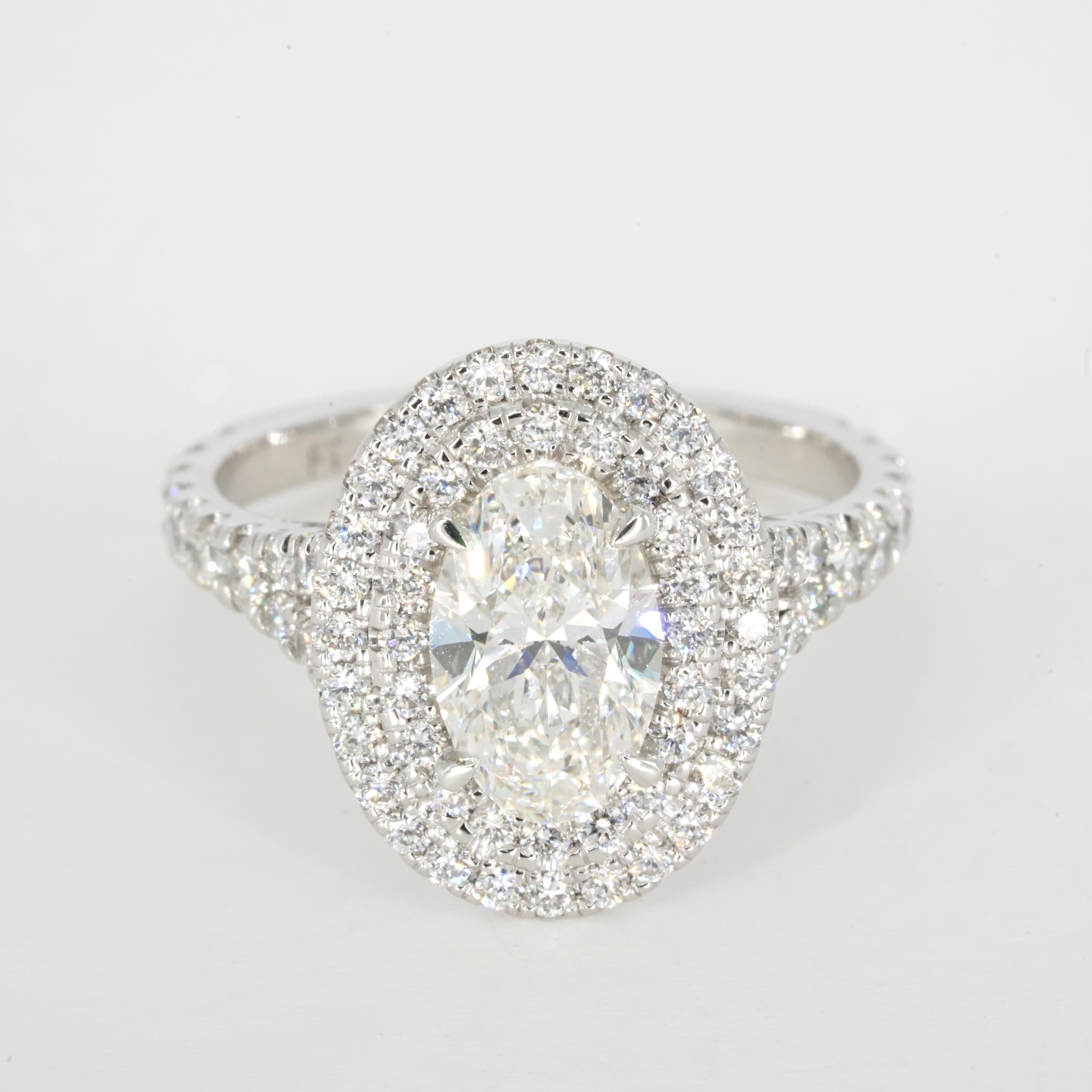 Contemporary GIA Certified 1.50 Carat F VS1 Oval Diamond Double Halo Engagement Gold Ring For Sale