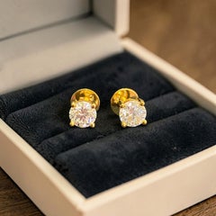GIA Certified 1.50 Carat F/VS1 Round Brilliant Diamond Stud Earrings in 18K Gold
