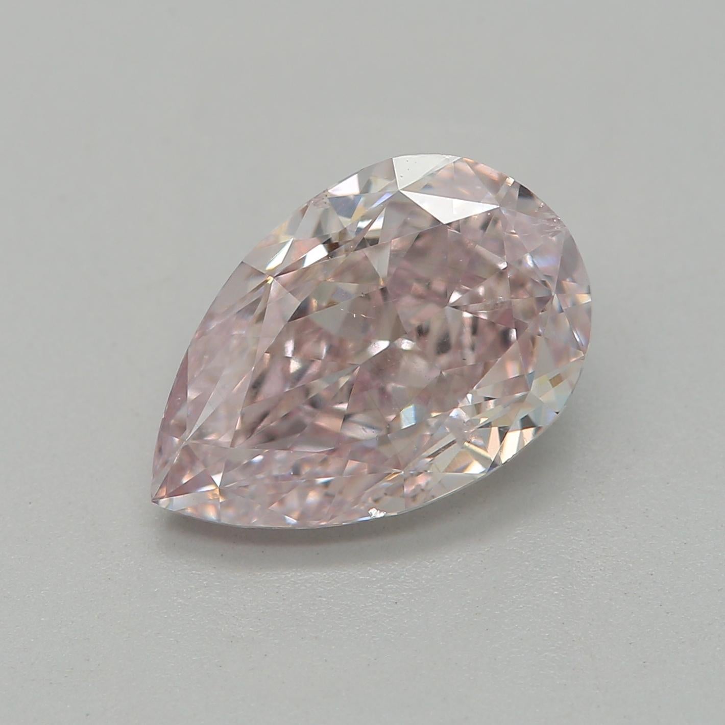 Certificate: GIA 
Report Number: 5221579578
Shape And Cut: Pear
Carat Weight: 1.50 carat
Measurements: 9.13 x 5.99 x 3.86 mm
Color Grade: Fancy Light Orangy Pink

FEATURES OF THE DIAMOND:

This Fancy Light Orangy Pink diamond is a rare and stunning