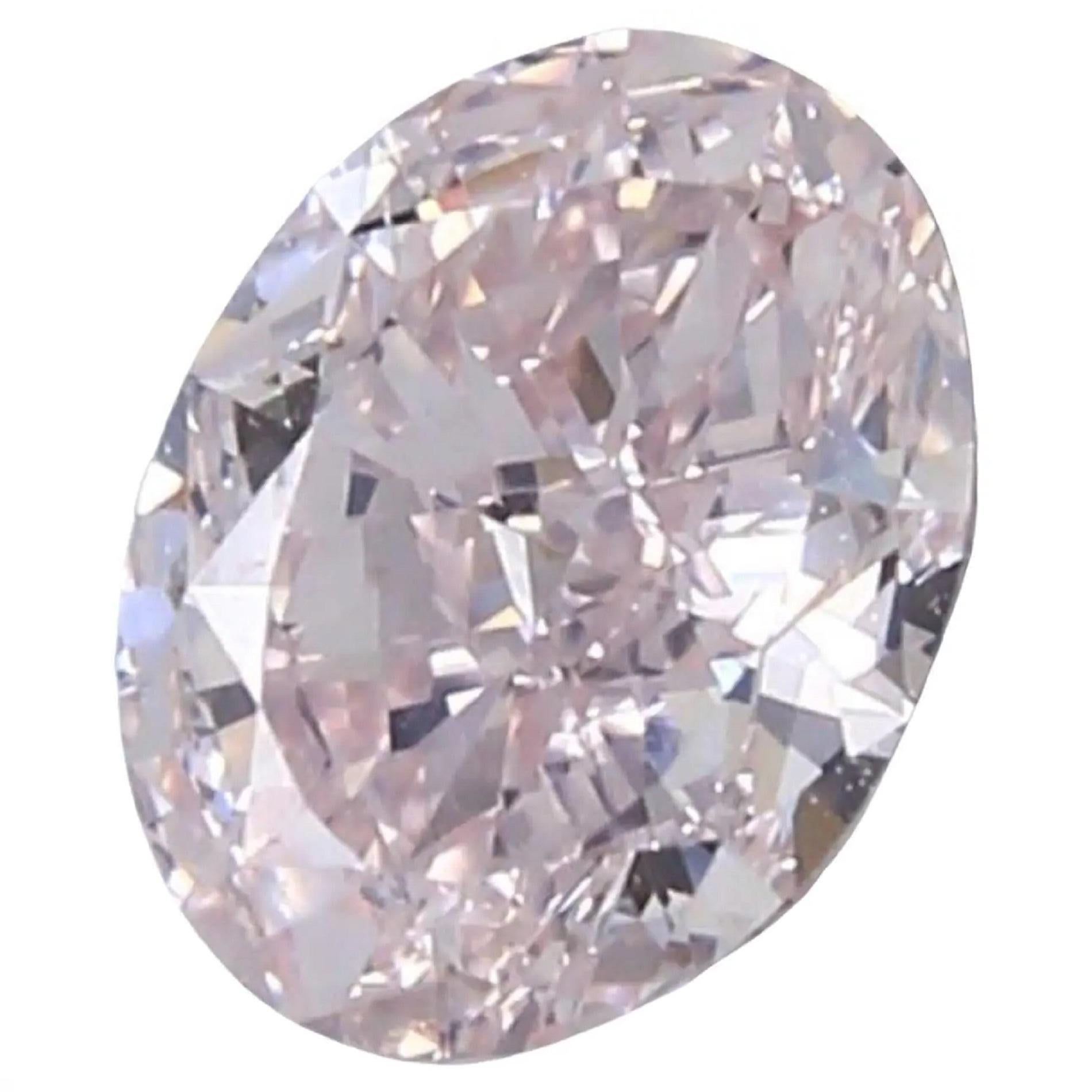 Modern GIA Certified 1.50 Carat Fancy Pink Oval Diamond 