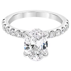 Diamant ovale certifié GIA de 1,50 carat, D SI2, avec 0,45ctw de diamants ronds