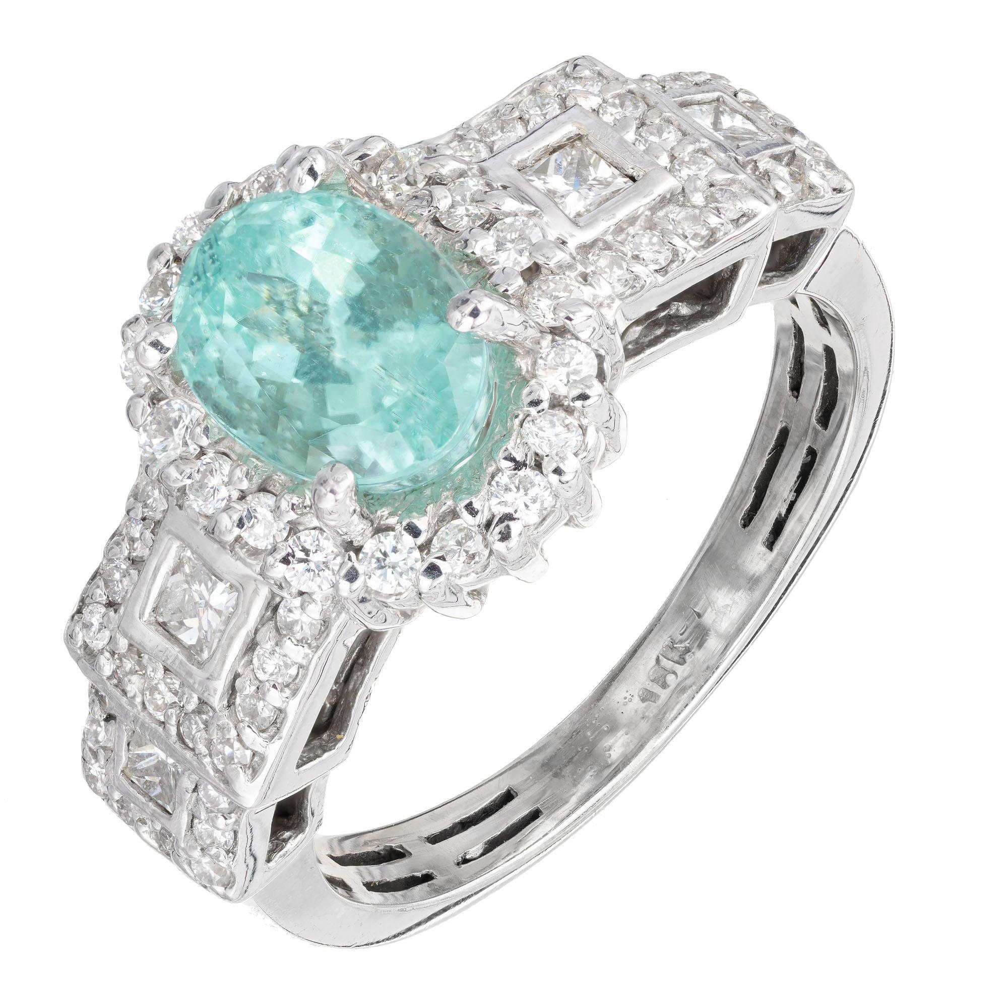 GIA Certified green blue Paraiba tourmaline and diamond engagement ring. Oval tourmaline center stone accented with round and princess cut diamonds, set in an 18k white gold setting. 

1 oval green-blue Paraiba tourmaline I, approx. 1.50ct GIA