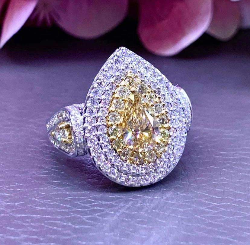 Amazing design, so chic and refined, perfect every days , but perfect also for party and events, handmade manufacture, created in 18k gold with a centre fancy yellow brownish diamond, pear cut, with 1.50 carats,VS2 clarity , GIA certified , and two