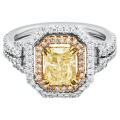 Bague de fiançailles double halo de diamants jaunes taille radiant de 1.50 carat certifiés GIA