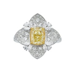 GIA Certified, 1.50ct Natural Fancy Light Yellow Cushion shape Diamond Ring 18KT