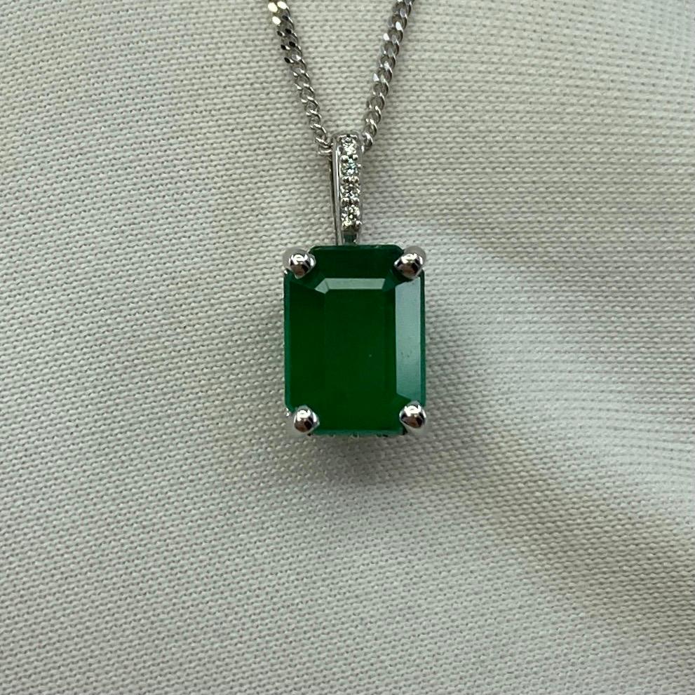 Rare Untreated Emerald & Diamond 18k White Gold Surround-Set Pendant Necklace.

Beautiful bright green emerald set in a fine 18 karat white gold diamond pendant.
1.50 Carat emerald fully certified by GIA  confirming stone as natural and untreated.